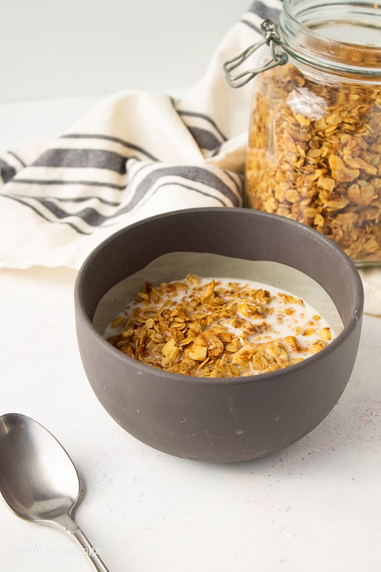 a bowl of granola with milk
