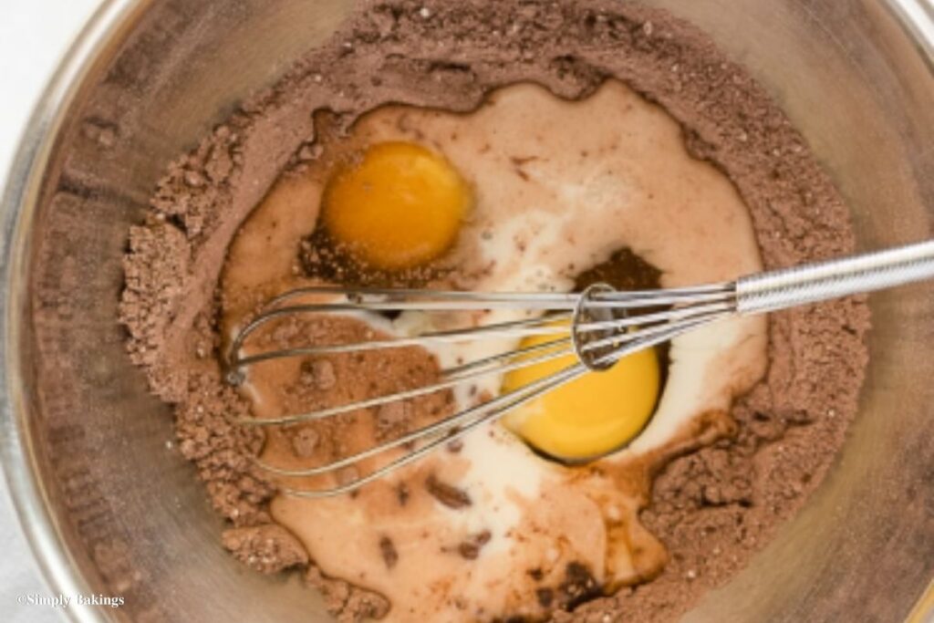 Ingredients mixed together in a stainless bowl