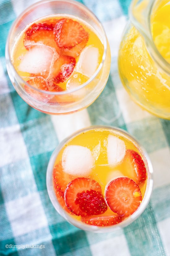 two glasses of sweet and refreshing strawberry mango lemonade