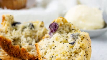 blueberry lemon poppy seed muffins halved on a table
