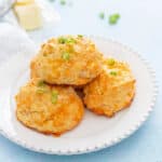 biscuits on a white plate on a blue table
