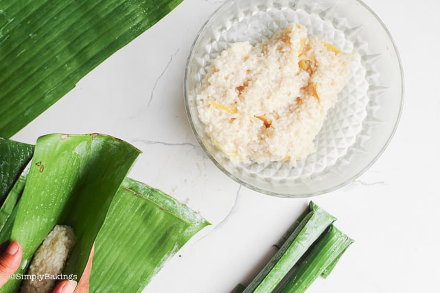 placed about 80 grams of cooked rice mixture on a banana leaf and rolled into logs