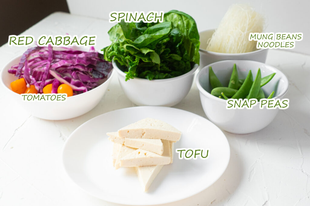 All ingredients for Vegan Lemongrass Soup in bowls