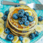 stack of egg free pancakes with blueberries on top