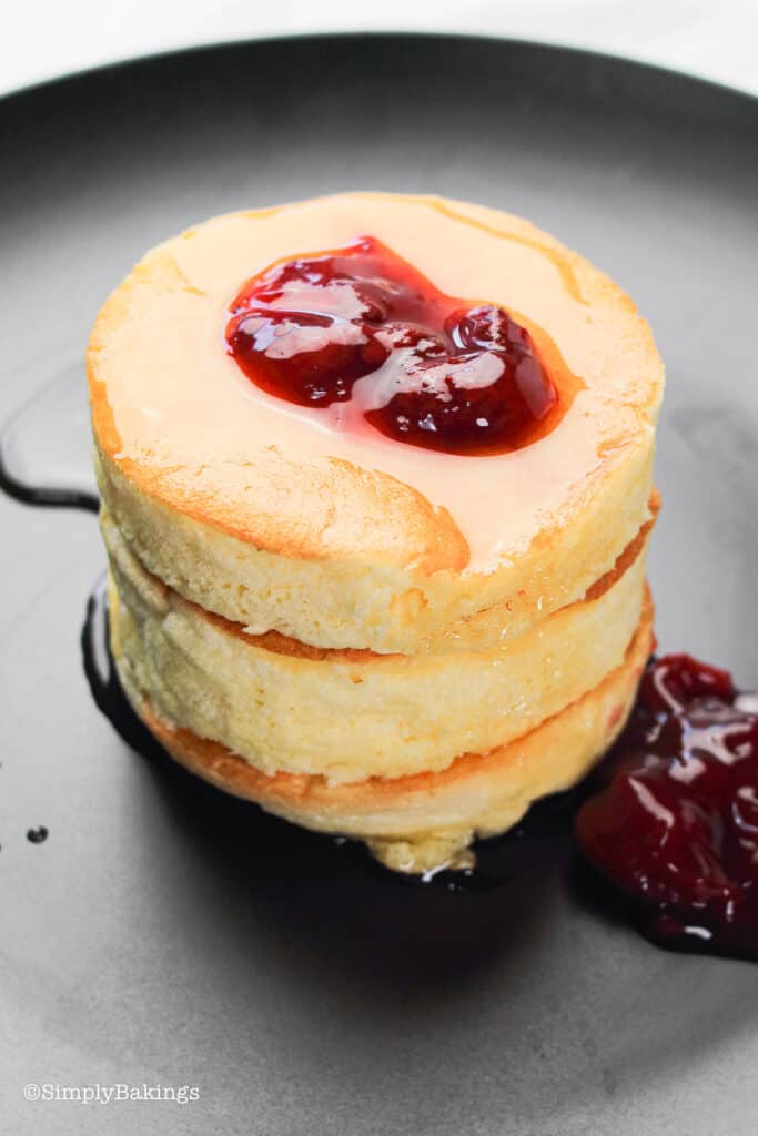 fluffy Japanese pancakes with a sweet berry sauce