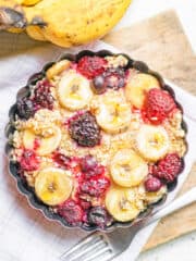 baked berries banana oats in a baking dish