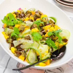 savory mango salad in a large bowl