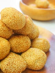 ube buchi served on a wooden plate