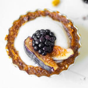 delicious fig blackberry tart on a table