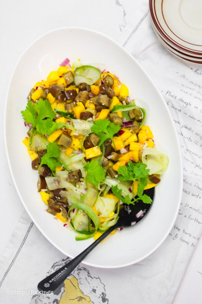A plate of Filipino Mango Salad with spoon