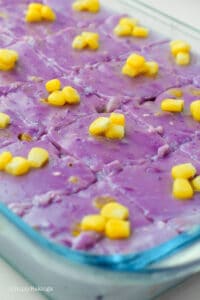 delicious ube maja blanca topped with corn kernels