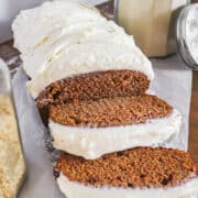 slices of gingerbread loaf with cream cheese icing