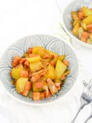 A bowl of ginisang sayote with spoon