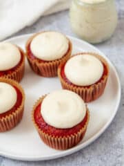 red velvet cupcakes lined in a circular plate