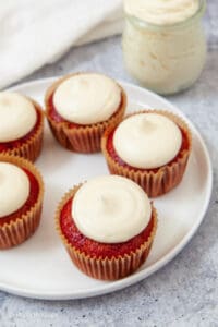 red velvet cupcakes lined in a circular plate