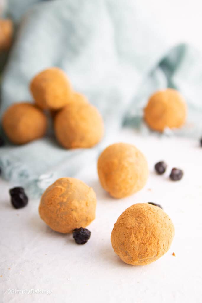 vegan blueberry truffles coated with cocoa powder
