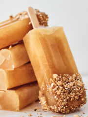 refreshing apple cider popsicles with sweet caramel sauce and crunchy granola