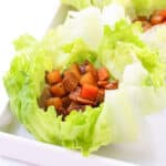 light and delicious tofu adobo lettuce wraps on a white serving plate