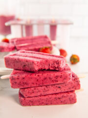delicious fruit popsicles served on a white bowl