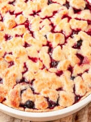mixed berry cobbler served on a pie plate