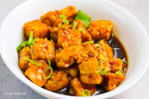 a bowl of delicious crispy orange tofu