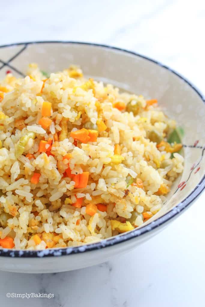 a serving of garlic fried rice on a plate