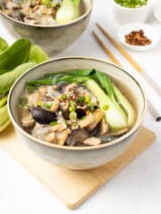 delicious bowl of ginger noodle soup with bok choy