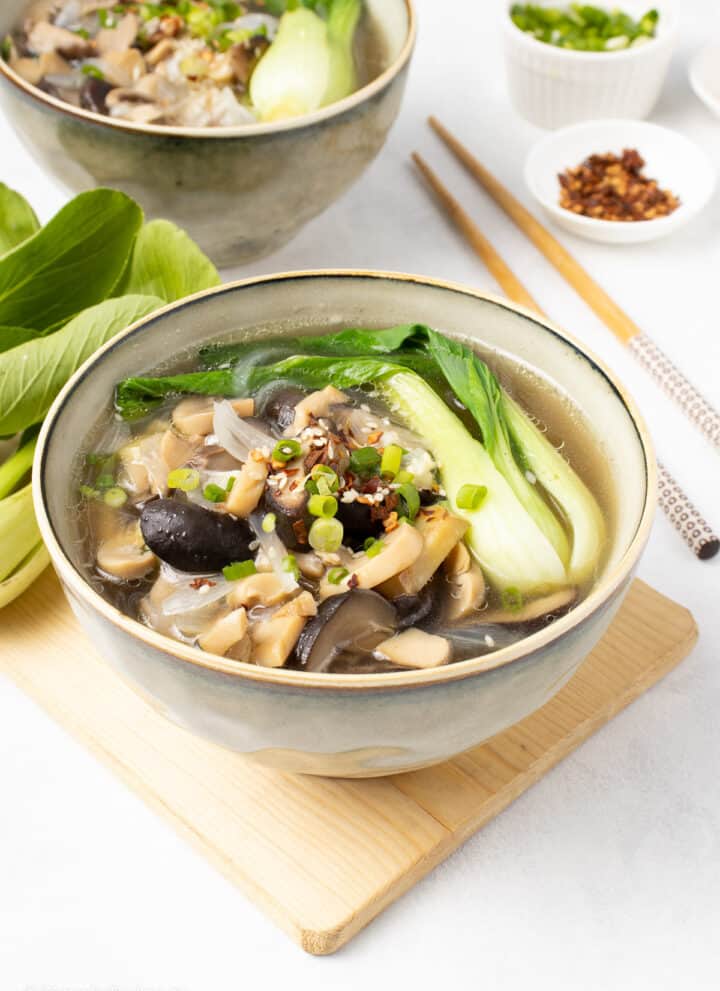 delicious bowl of ginger noodle soup with bok choy