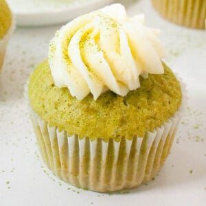 matcha cupcakes deliciously topped with cream cheese frosting