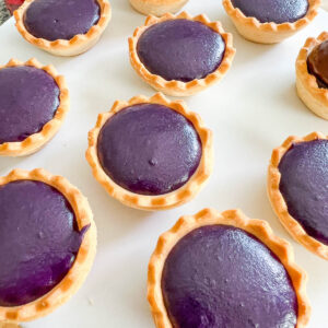 sweet and delicious ube tarts on a white plate