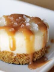 creamy mini salted caramel cheesecakes with caramel glaze