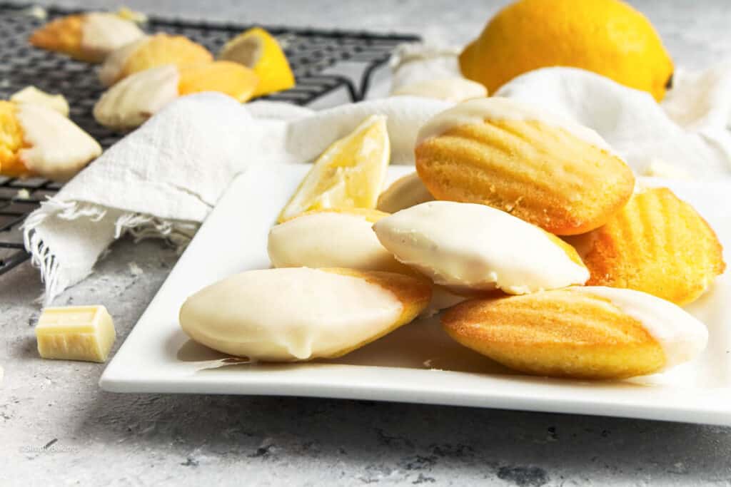 tasty white chocolate dipped madeleines with lemon