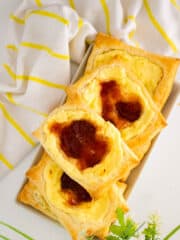 a stack of sweet and delicious guava danish on a white surface