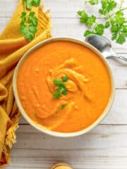 vegan sweet potato soup with miso garnished with basil