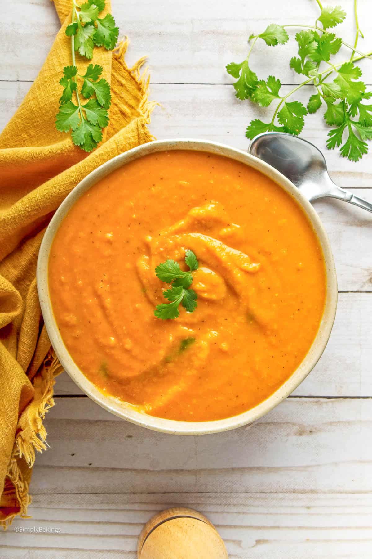 vegan sweet potato soup with miso garnished with basil