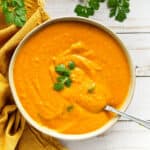 creamy miso soup in bowl with spoon