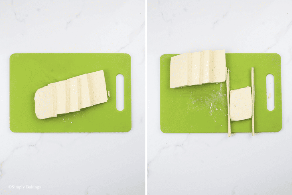 cut tofu slices on a green chopping board