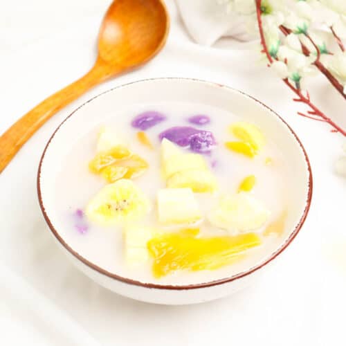 creamy filipino bilo bilo on a bowl with wooden spoon