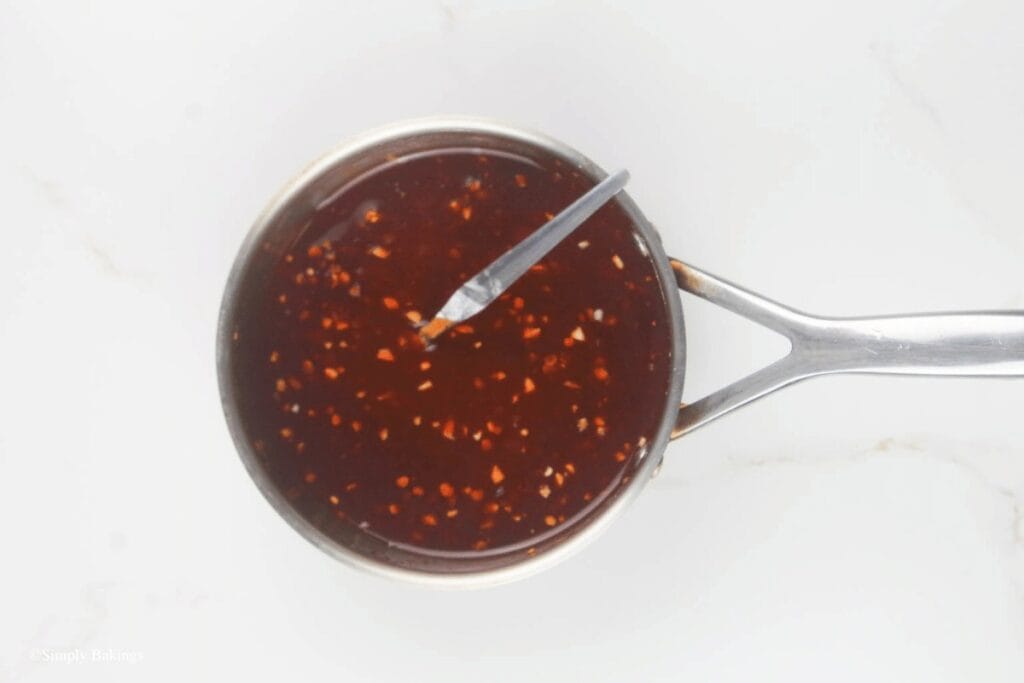 mixing huli huli sauce, image created by SimplyBakings