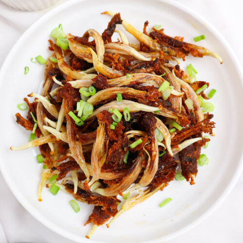 filipino fired dilis garnished with spring onions