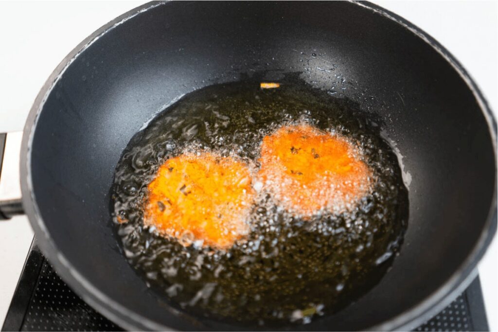 frying okoy in pan