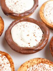 delicious tiramisu tartlets dusted with cocoa powder