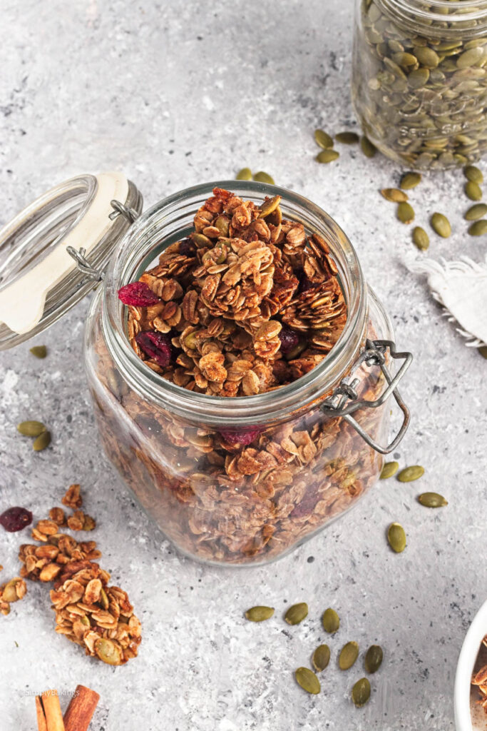 granola pumpkin spice inside a mason jar with lid opened