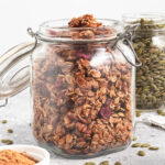 crunchy and yummy pumpkin spice granola in a mason ar
