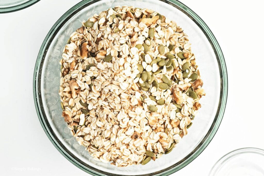 combined oats, chopped walnuts, and pepitas