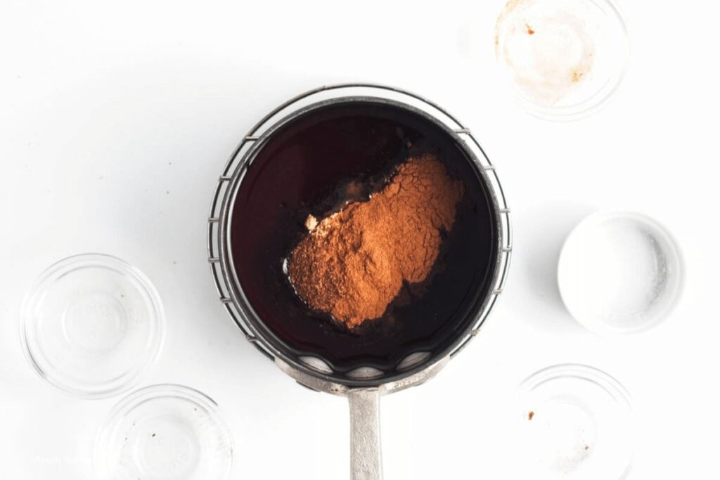 hot mixture of coconut oil and maple syrup