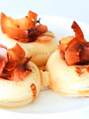 maple vegan bacon donuts on a white plate