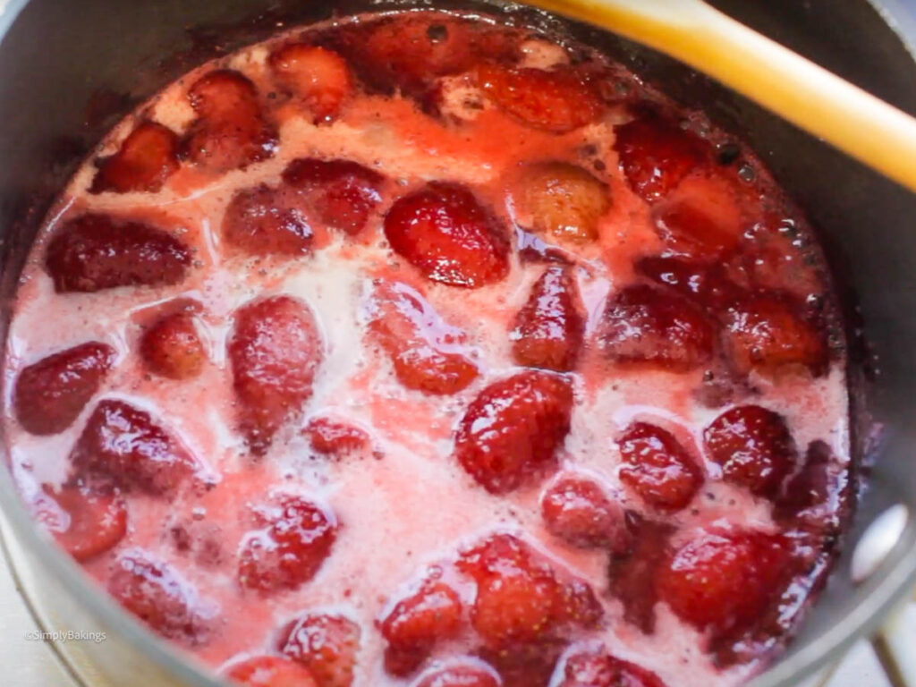 strawberries in a small pot with cornstarch mixture