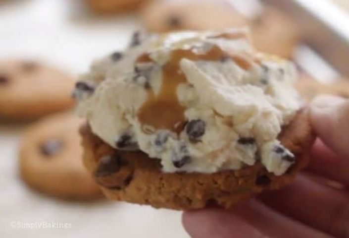 ice cream with caramel drizzled on a cookie