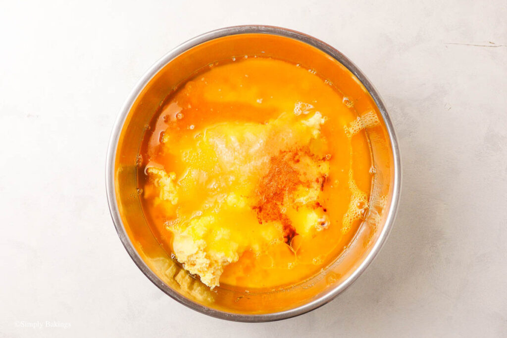 Wet and dry ingredients in a mixing bowl
